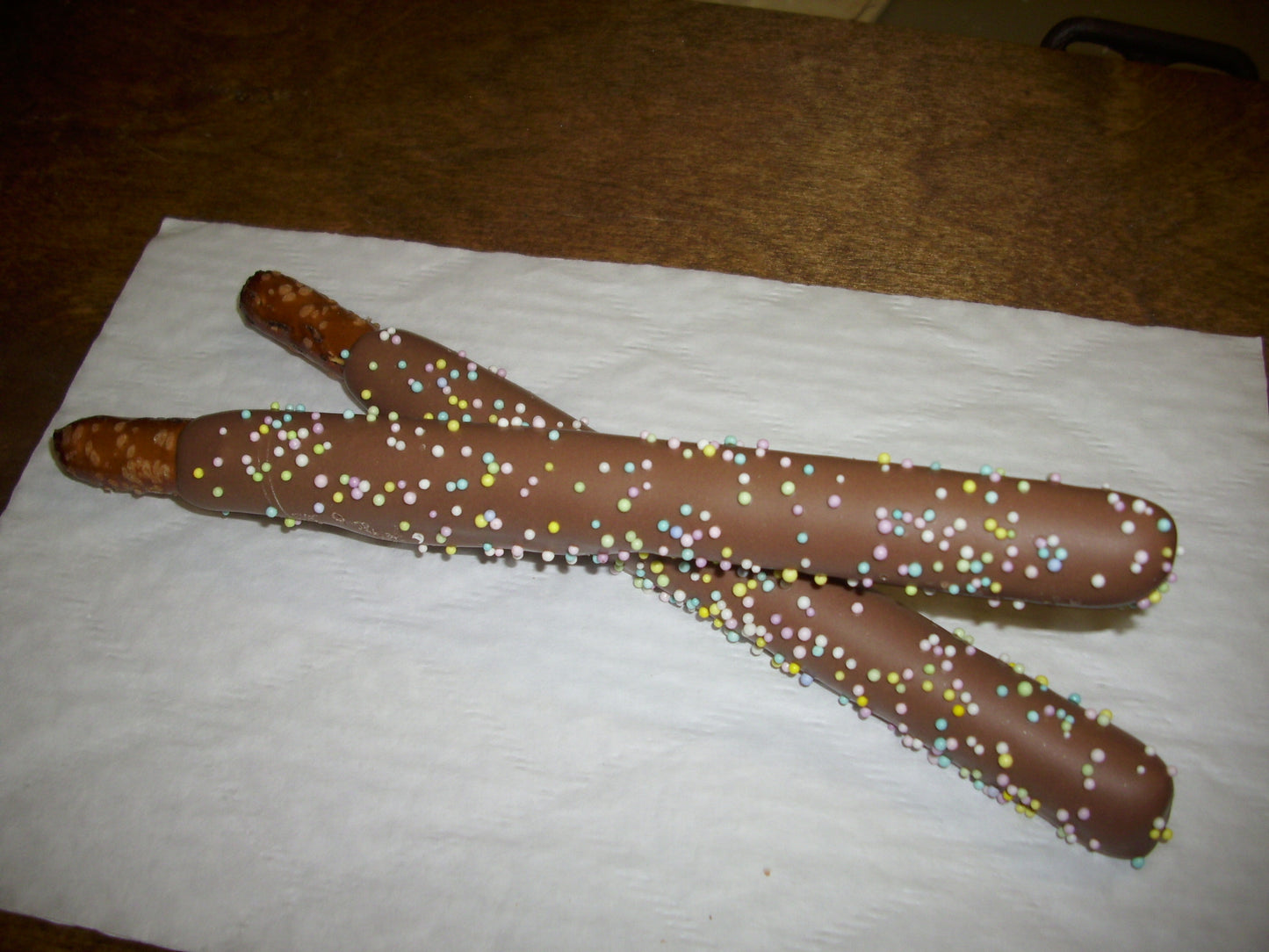 Milk Chocolate Dipped Pretzel Rod w/ non pariels