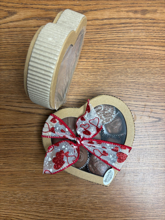 small heart shapped box of chocolate